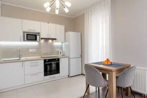 в новом доме на Оболони 15